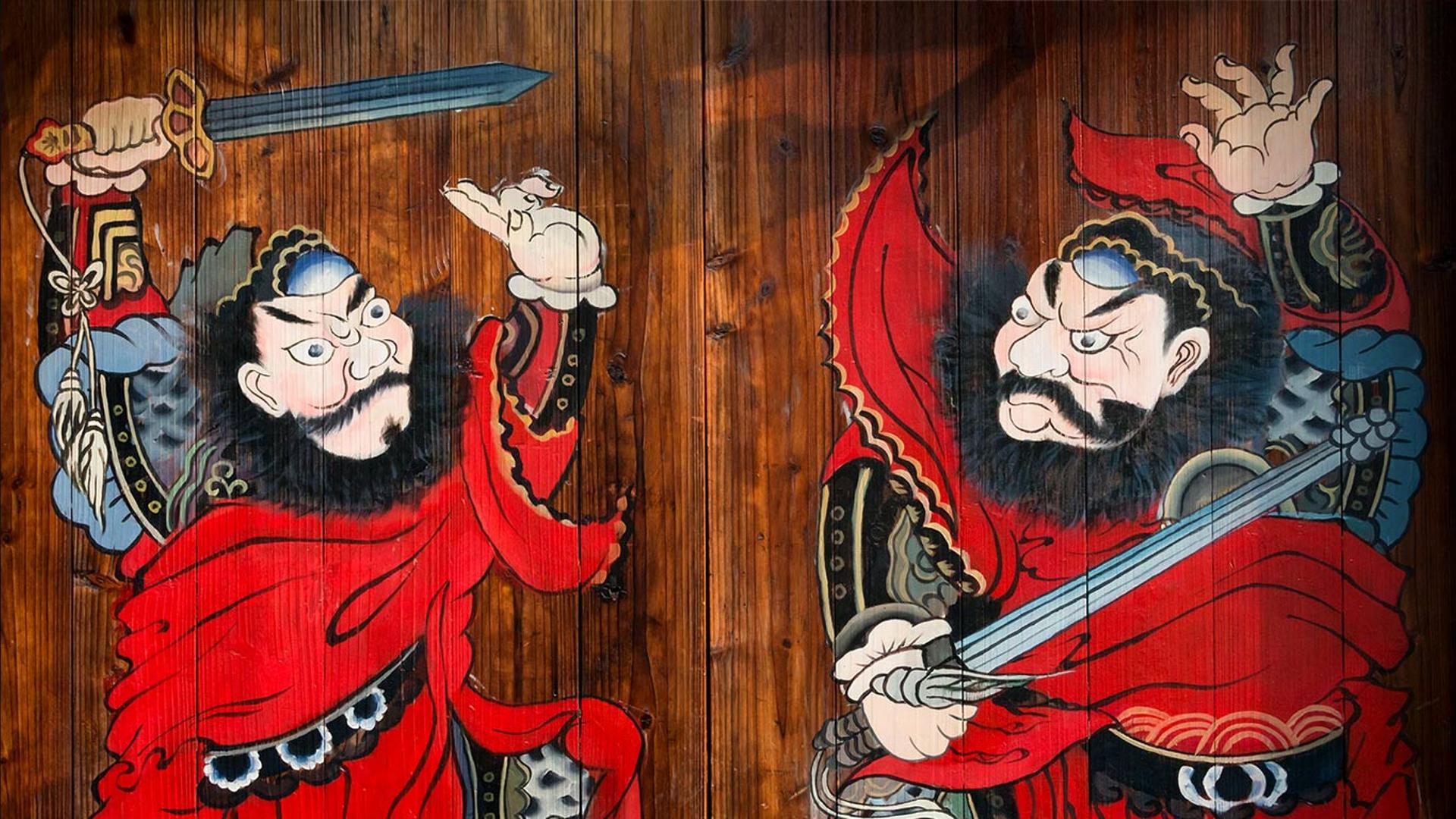 月河古镇一户人家门前画着的门神 ，浙江